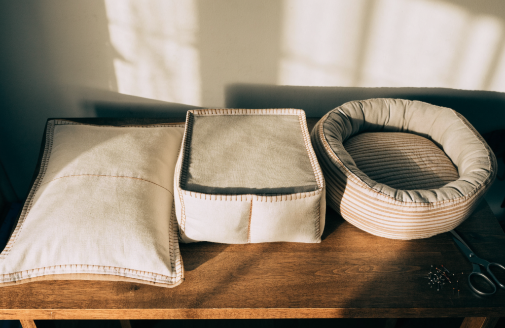 Flat pillow, boxed cushion and round bolster sewn dog beds