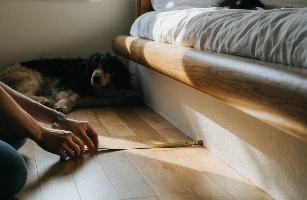 Measuring the floor gap beside a bed for a large dog bed